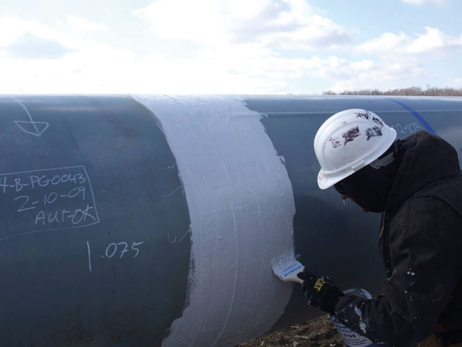 Protal 7125 being applied to a girth weld