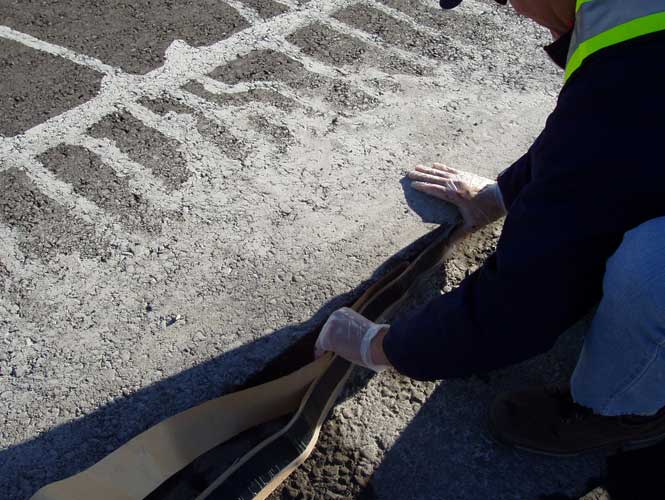 Denso Re-Instatement Tape application to existing asphalt 