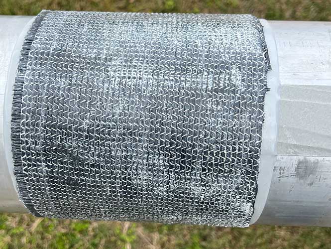 Denso Protal 2800CF engineered composite repair system for structural reinforcement of steel pipe, elbows, tees, and similar pipeline geometries.