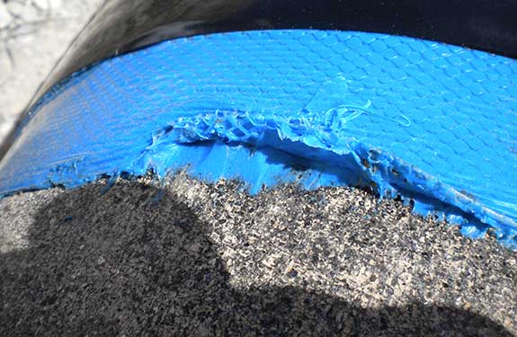 Viscotaq viscoelastic pipeline coating rehabilitation system applied to aged legacy pipeline coating.